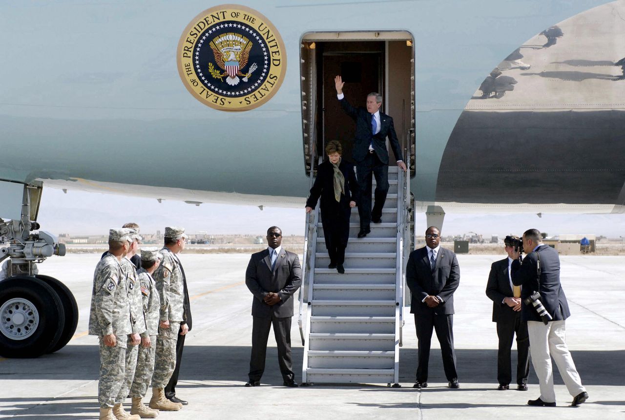 Bush and first lady Laura Bush exit Air Force One as they arrive at an air base north of Kabul, Afghanistan, in March 2006.