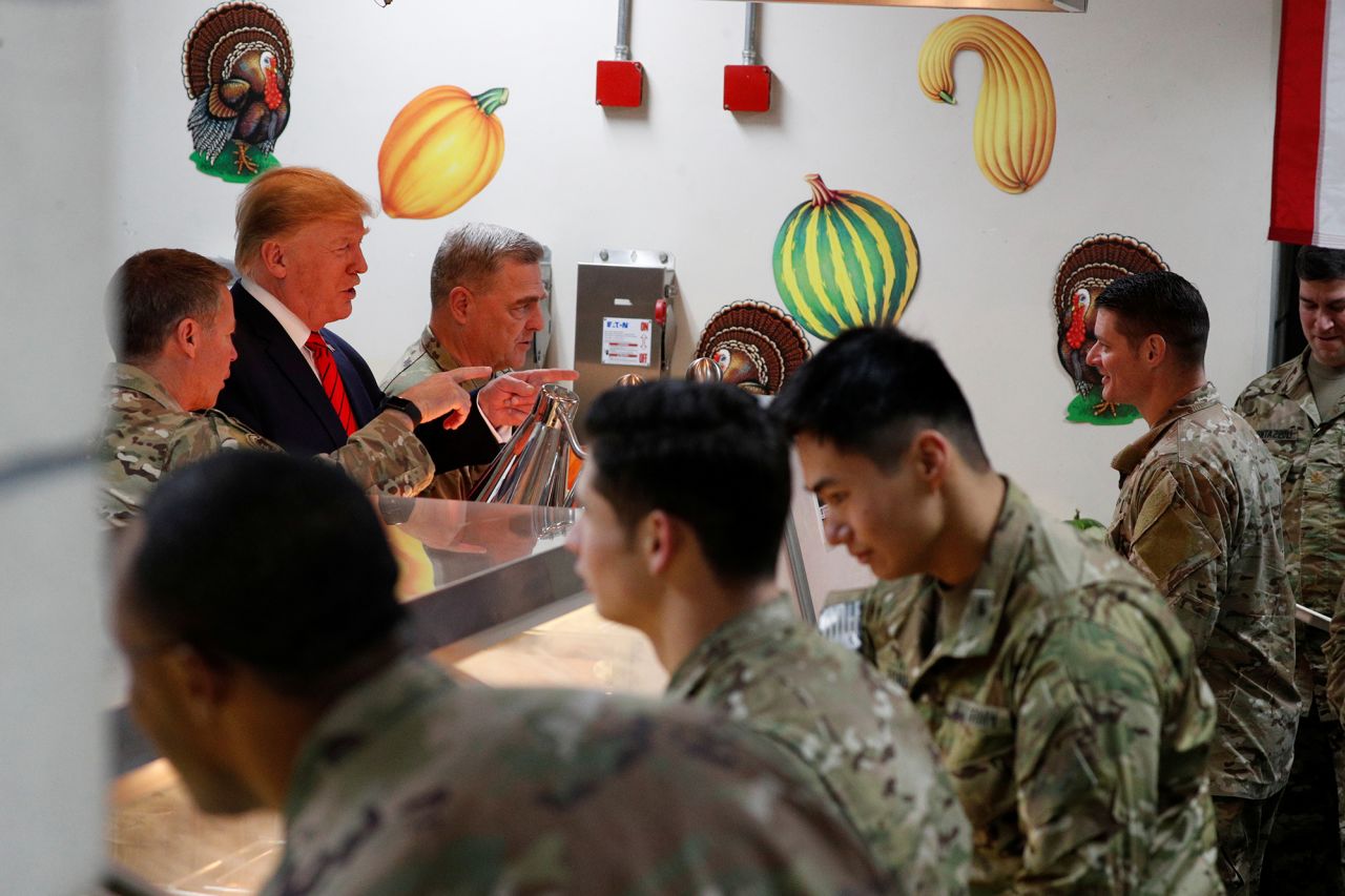 Trump serves food to US troops during a surprise visit to Afghanistan in November 2019.