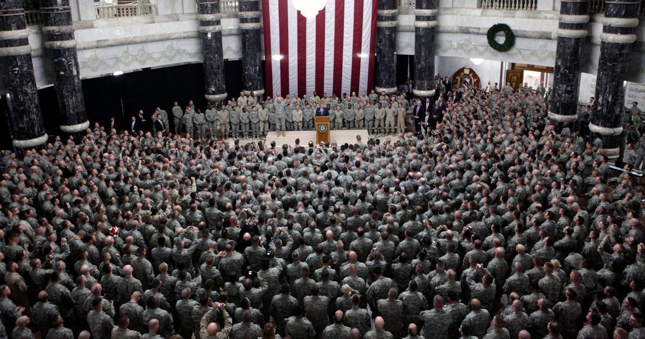 Bush speaks with US troops in Baghdad in December 2008.
