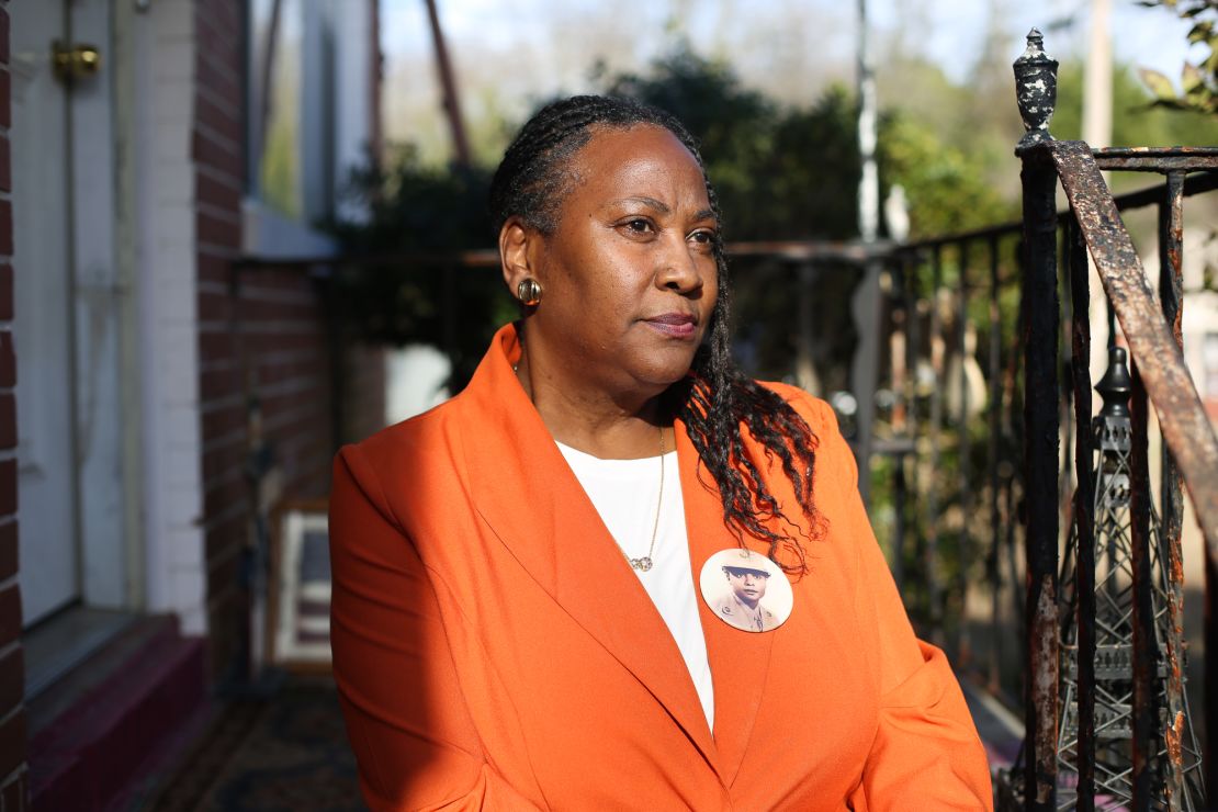 Brenda Partridge-Brown wears a pin showing her mother, Willie Belle Irvin-Partridge, who served in the 6888th battalion, on February 5, 2023. Brown is writing a book about her mother.