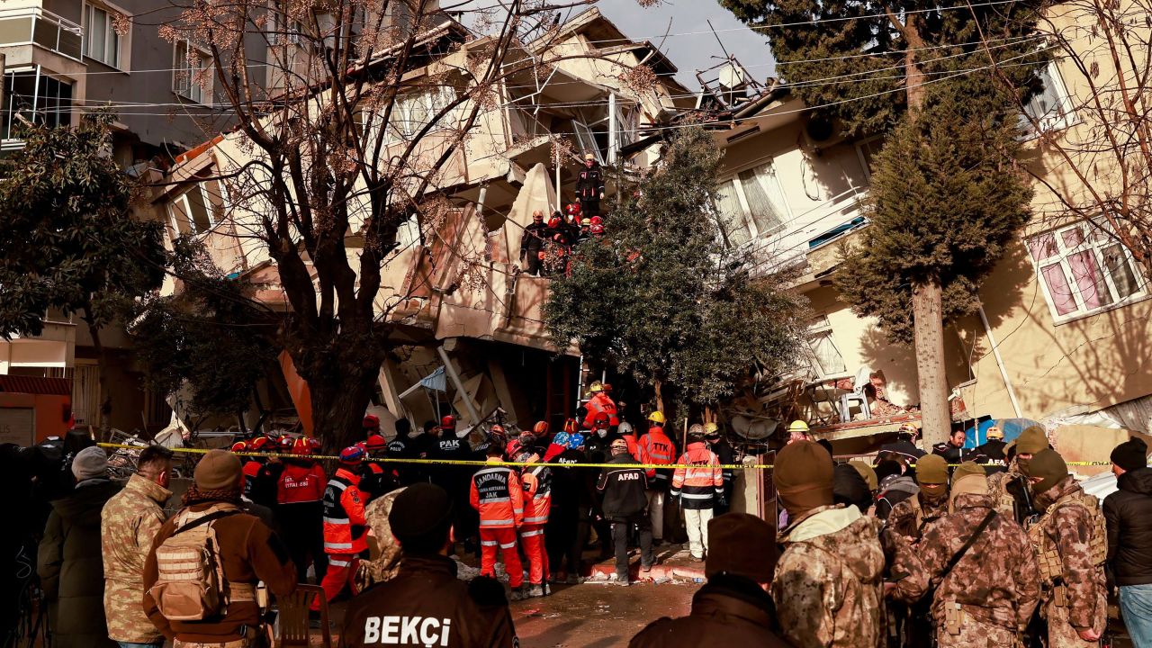 Rescuers, pictured on Tuesday search for victims after a series of aftershocks ripped through Turkey's southern Hatay province.