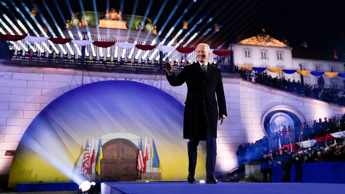 Biden walks out to deliver a speech in Warsaw on Tuesday. "One year ago, the world was bracing for the fall of Kyiv," he said. "Well, I've just come from a visit to Kyiv and I can report Kyiv stands strong. Kyiv stands proud, it stands tall and most important, it stands free."