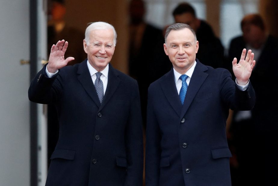 Biden and Polish President Andrzej Duda gesture during a welcome ceremony outside the Presidential Palace in Warsaw, Poland, on Tuesday, February 21.