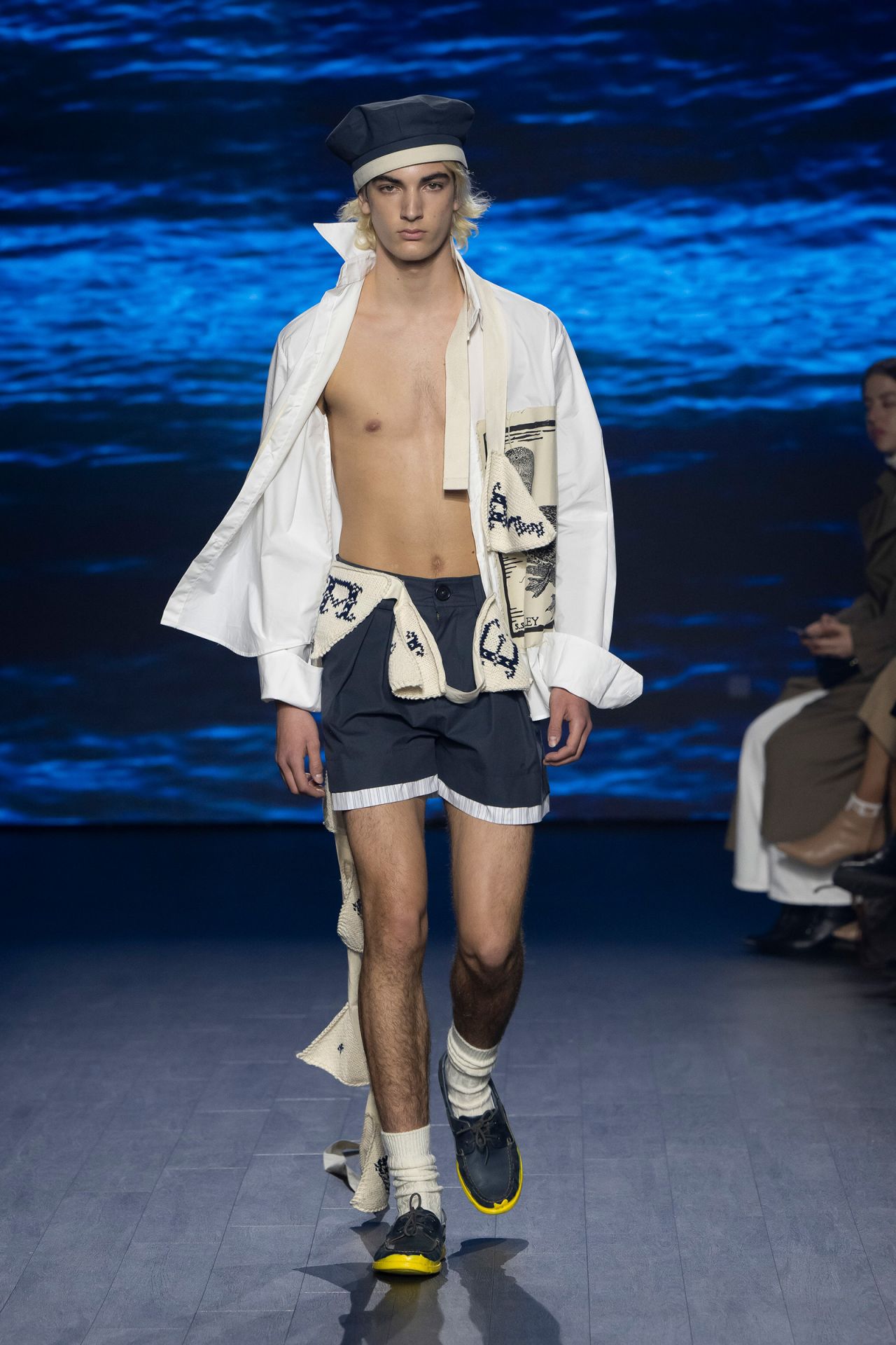 As if plucked straight from the stormy seas, a model walks the runway during the S.S. Daley show.