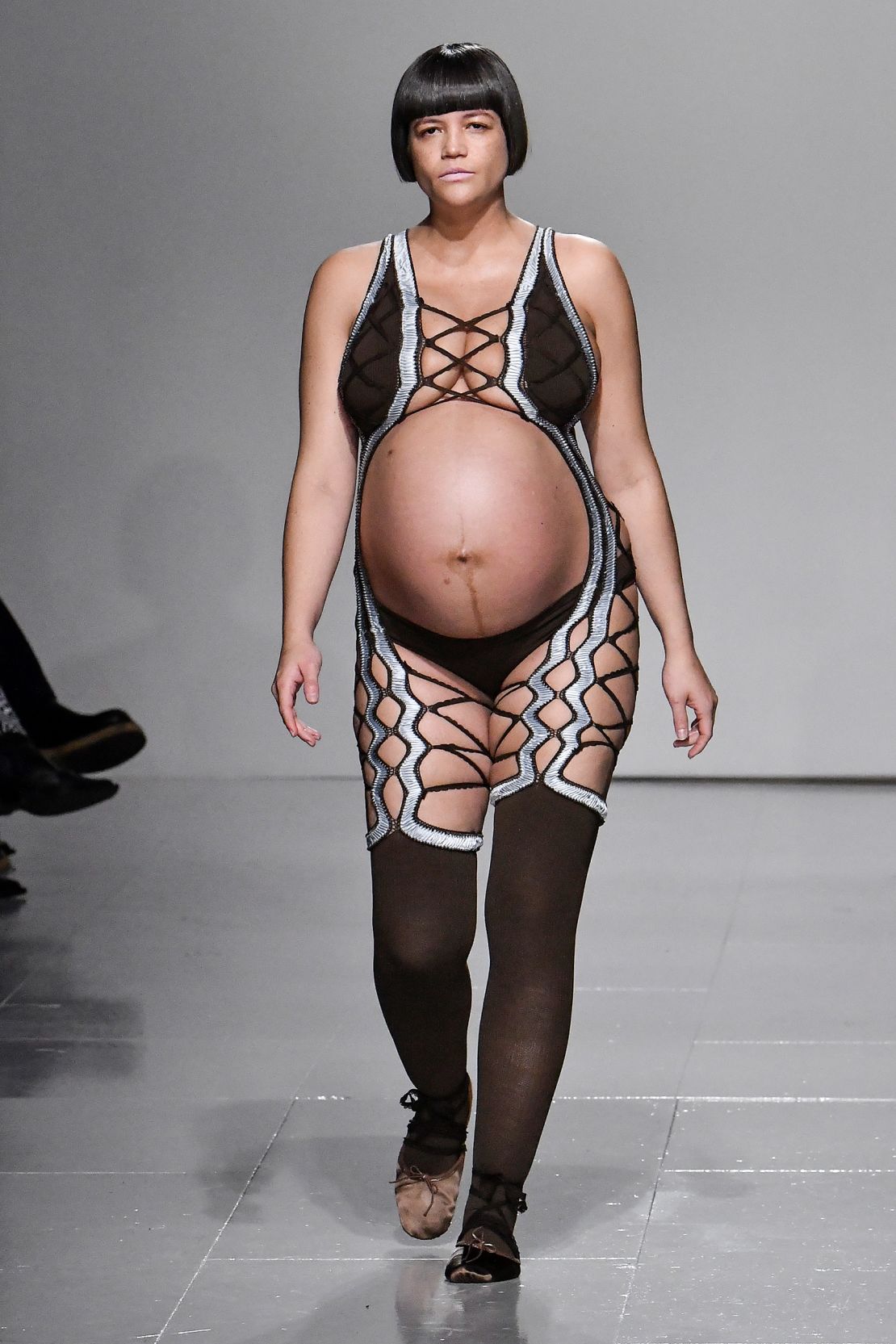 Pregnant artist and model Tessa Kuragi walks in the Sinead O'Dwyer show — one of the most diverse casting moments during London Fashion Week.