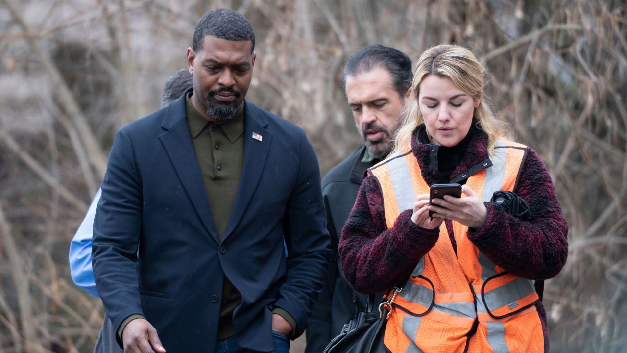 Environmental Protection Agency Administrator Michael Regan, left, walks with his staff through East Palestine, Ohio, on February 16, 2023.