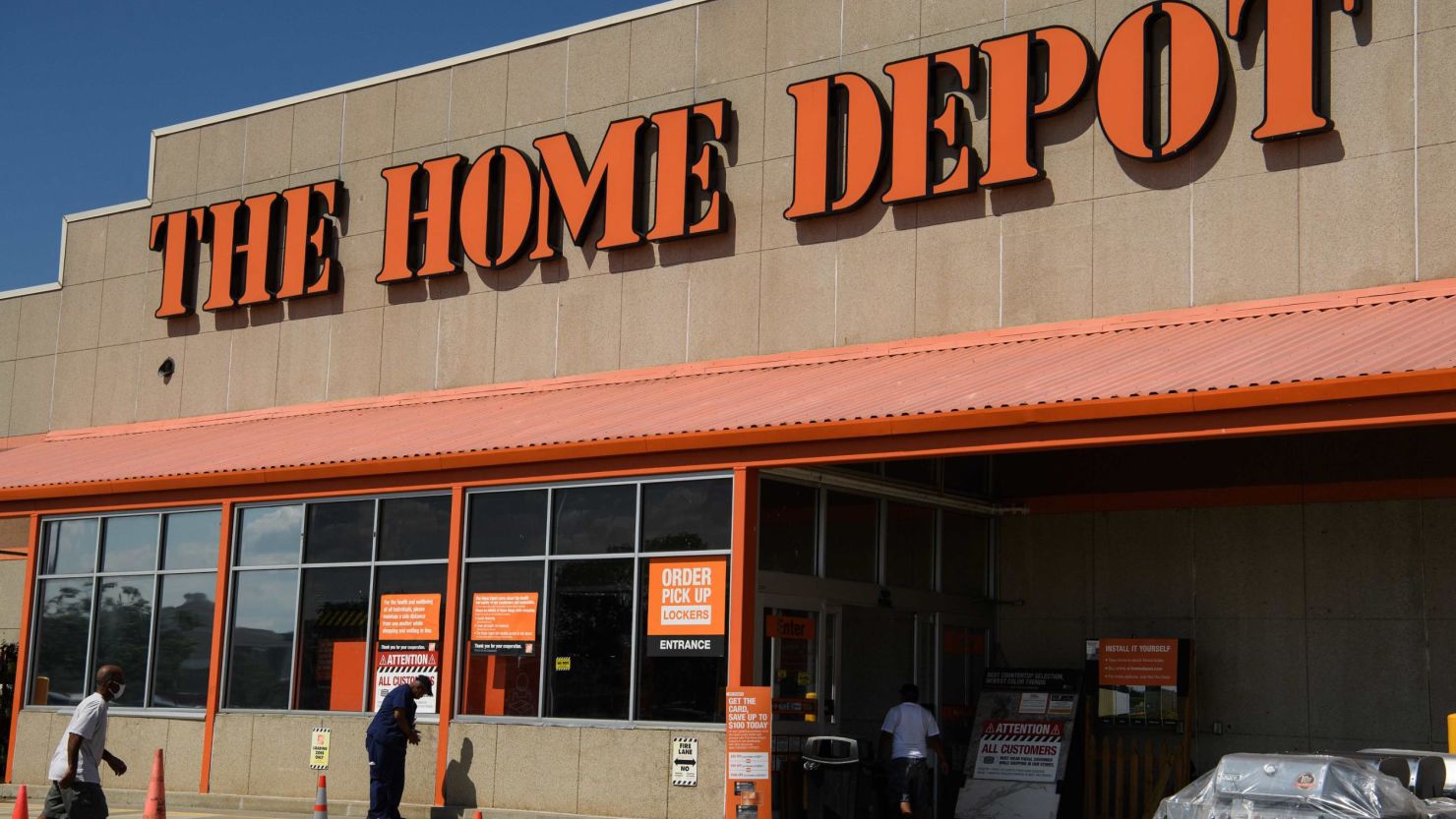 A Home Depot store is seen in Washington, DC, on August 18, 2020. - US retailers were helped by the 2.2 trillion USD CARES Act stimulus package passed in late March which included one-time payments of 1,200 USD to all Americans as well as an additional 600 USD in weekly unemployment benefits for people who lost their jobs. Home Depot said stimulus payments also played a role in that company's 24.5 percent rise in second-quarter profits to $4.3 billion, as home-bound customers invested in home improvement projects like deck building, painting and landscape work. (Photo by NICHOLAS KAMM / AFP) (Photo by NICHOLAS KAMM/AFP via Getty Images)