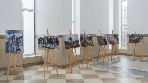 A year after the Russians' brutal occupation, Bucha is rebuilding. But the survivors remain broken 7 An exhibition of pictures is seen in a hall in the Church of St. Andrew.
