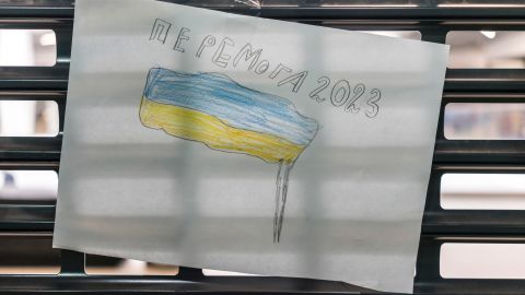 One of Sonya's drawings shows a Ukrainian flag and says 