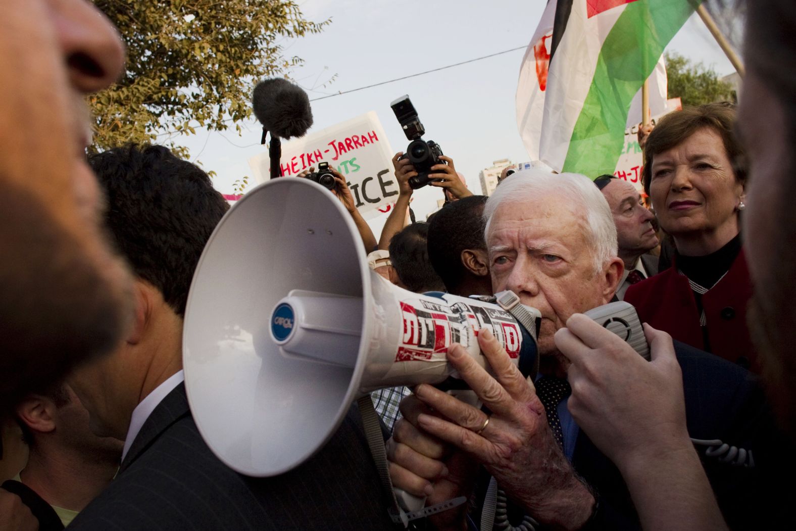 Carter visits a weekly anti-settlement protest in the east Jerusalem neighborhood of Sheikh Jarrah in October 2010. Former Irish President Mary Robinson is on the right.