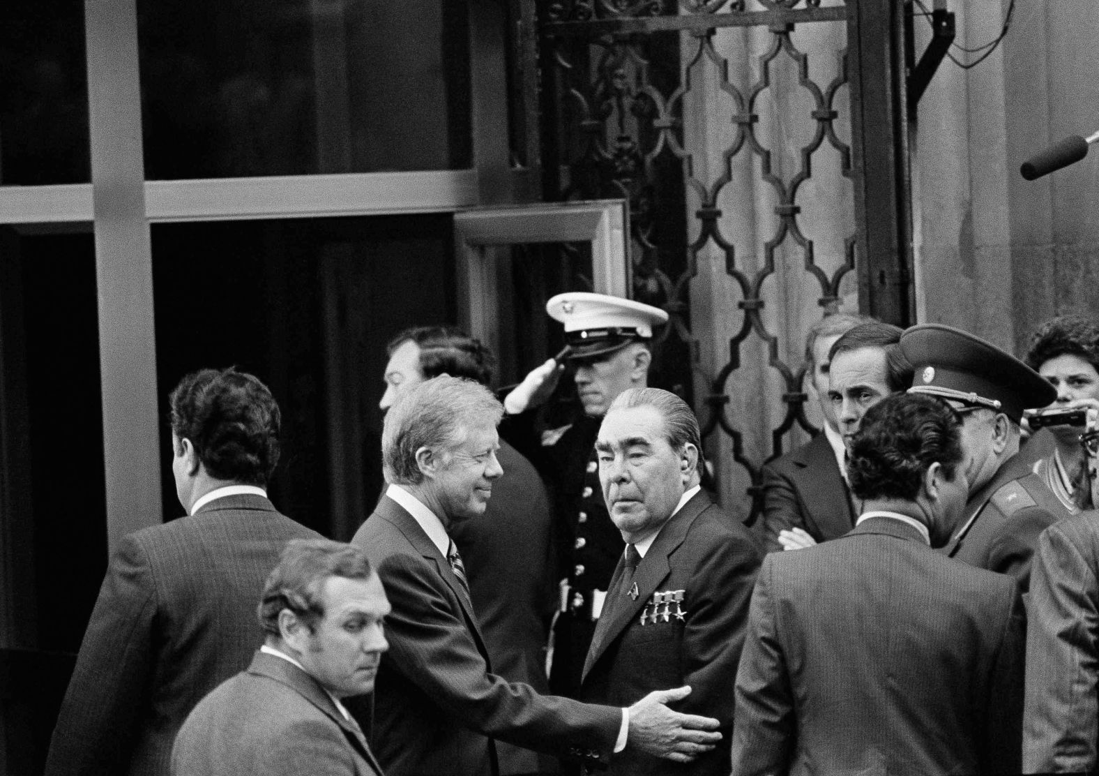 Carter walks with Soviet leader Leonid Brezhnev outside the US embassy in Vienna, Austria, in June 1979. They held private talks before heading to the Imperial Hofburg Palace to sign the SALT II nuclear treaty.