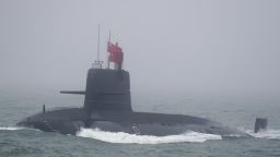 A Great Wall 236 submarine of the Chinese People's Liberation Army (PLA) Navy, billed by Chinese state media as a new type of conventional submarine, participates in a naval parade to commemorate the 70th anniversary of the founding of China's PLA Navy in the sea near Qingdao, in eastern China's Shandong province on April 23, 2019. - China celebrated the 70th anniversary of its navy by showing off its growing fleet in a sea parade featuring a brand new guided-missile destroyer. (Photo by Mark Schiefelbein / POOL / AFP)        (Photo credit should read MARK SCHIEFELBEIN/AFP via Getty Images)