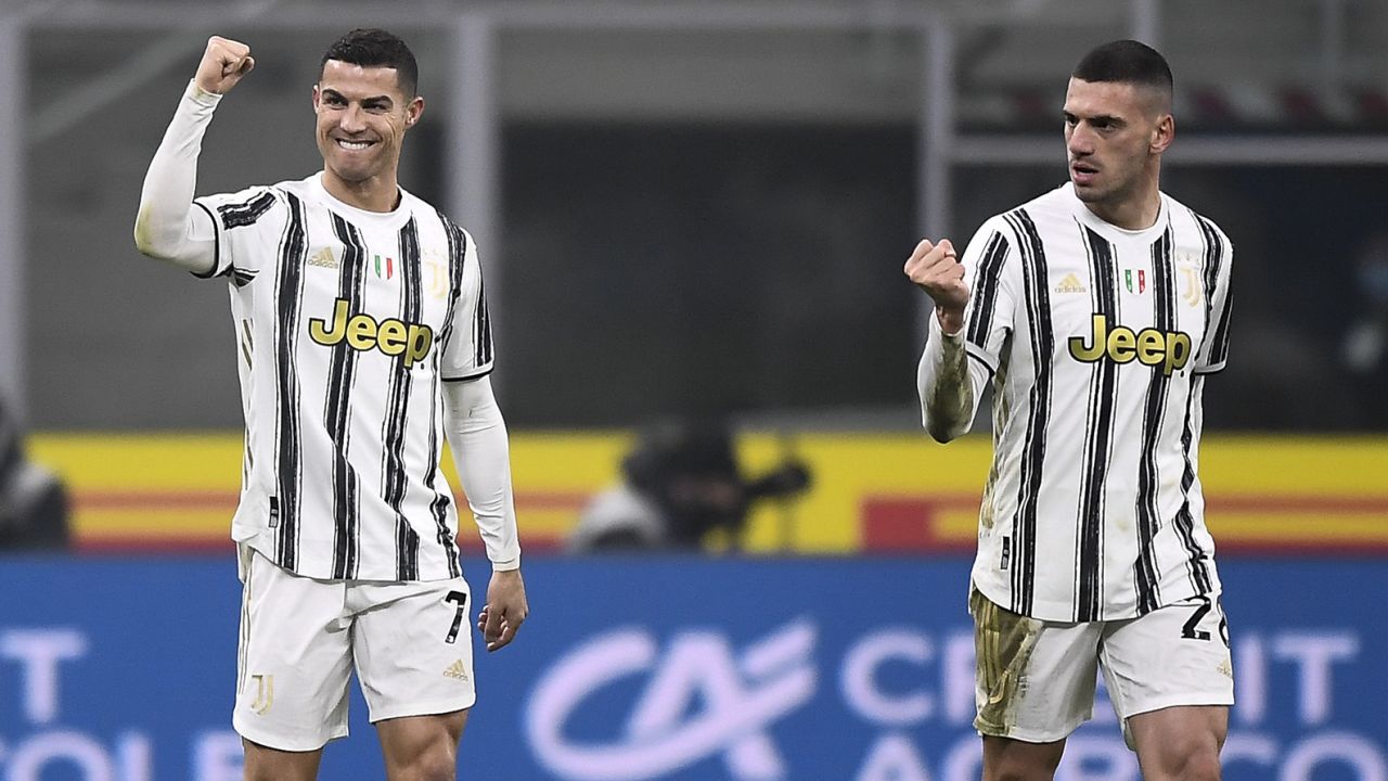 STADIO GIUSEPPE MEAZZA, MILAN, ITALY - 2021/02/02: Cristiano Ronaldo (L) of Juventus FC celebrates with Merih Demiral of Juventus FC  after scoring a goal during the Coppa Italia football match between FC Internazionale and Juventus FC. Juventus FC won 2-1 over FC Internazionale. (Photo by Nicolò Campo/LightRocket via Getty Images)