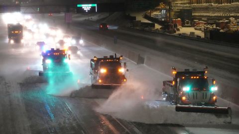 Snow plows clear a highway in Minneapolis on Wednesday, February 22, 2023.