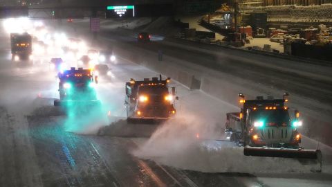 Snow plows clear a highway in Minneapolis on Wednesday, February 22, 2023.