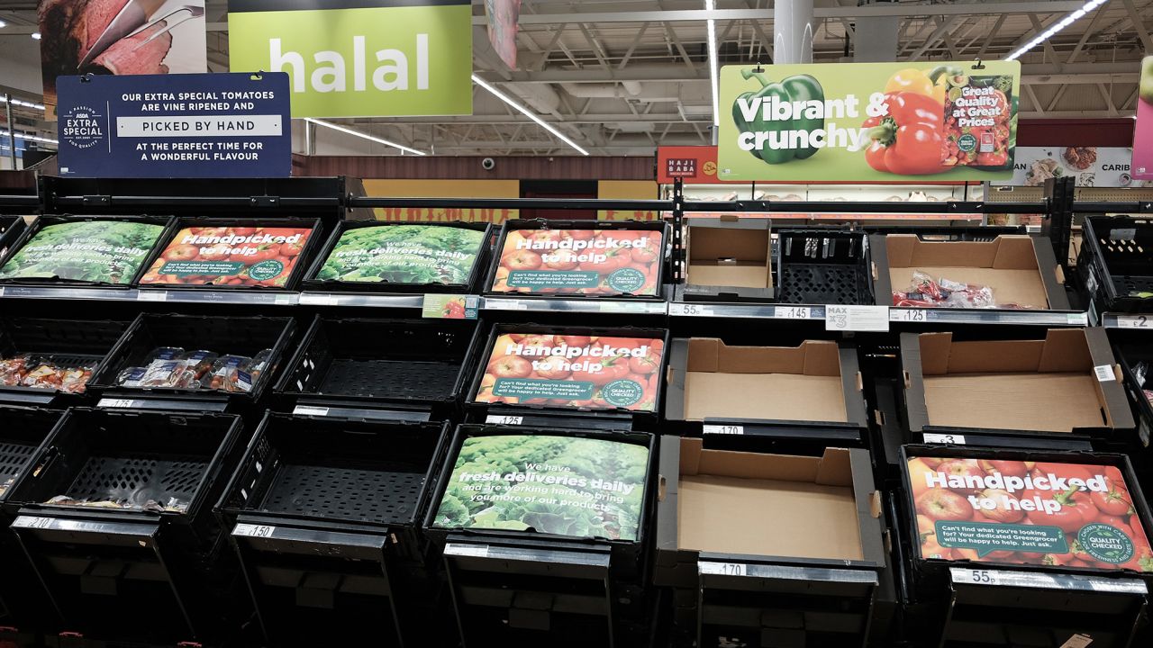 Empty fruit and vegetable shelves at an Asda store in London on February 21, 2023. 