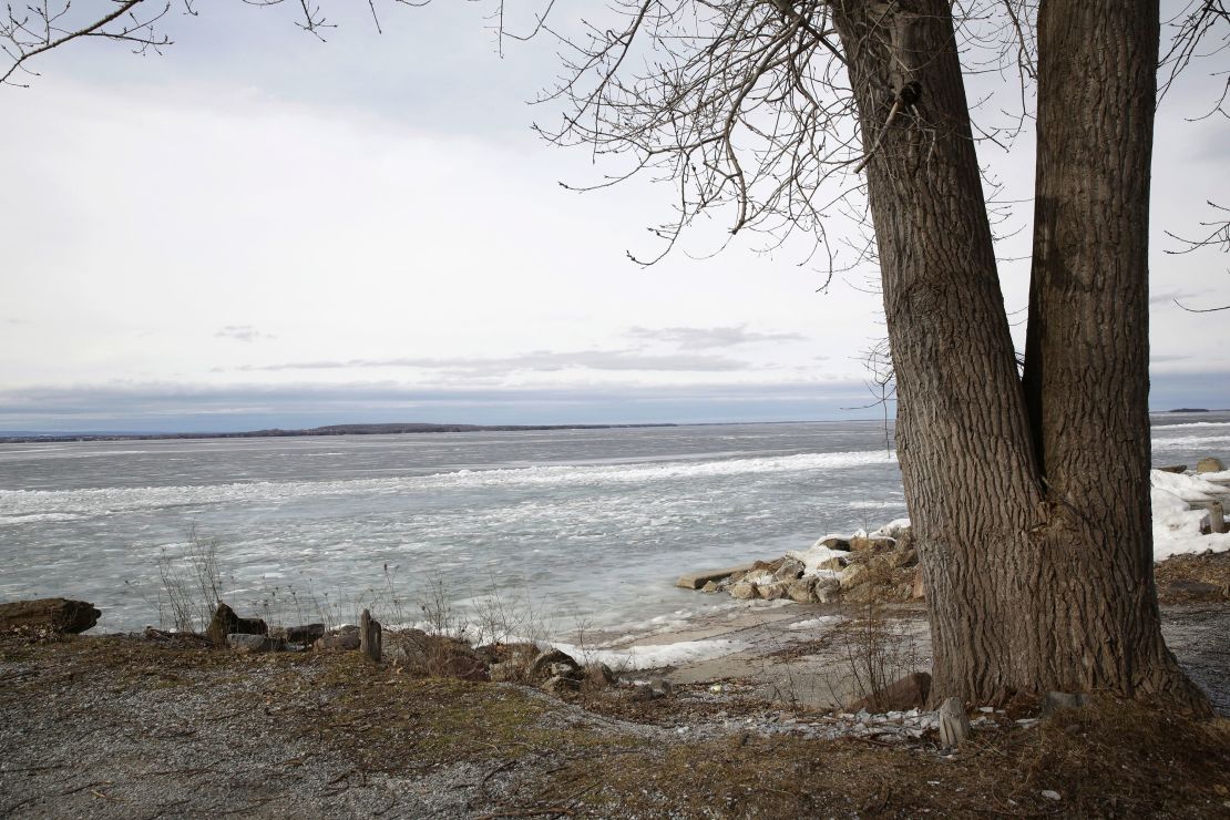 The Lake Champlain shoreline on February 16. The lake near the access area is covered with ice, but officials are warning anglers to stay off the lake because unseasonably warm temperatures have made it unsafe. 