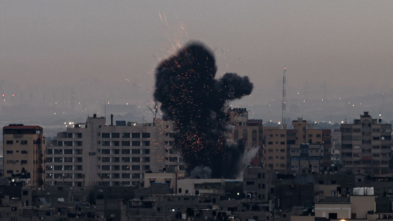 Smoke rises above buildings in Gaza as Israel launched airstrikes on February 23, 2023. 