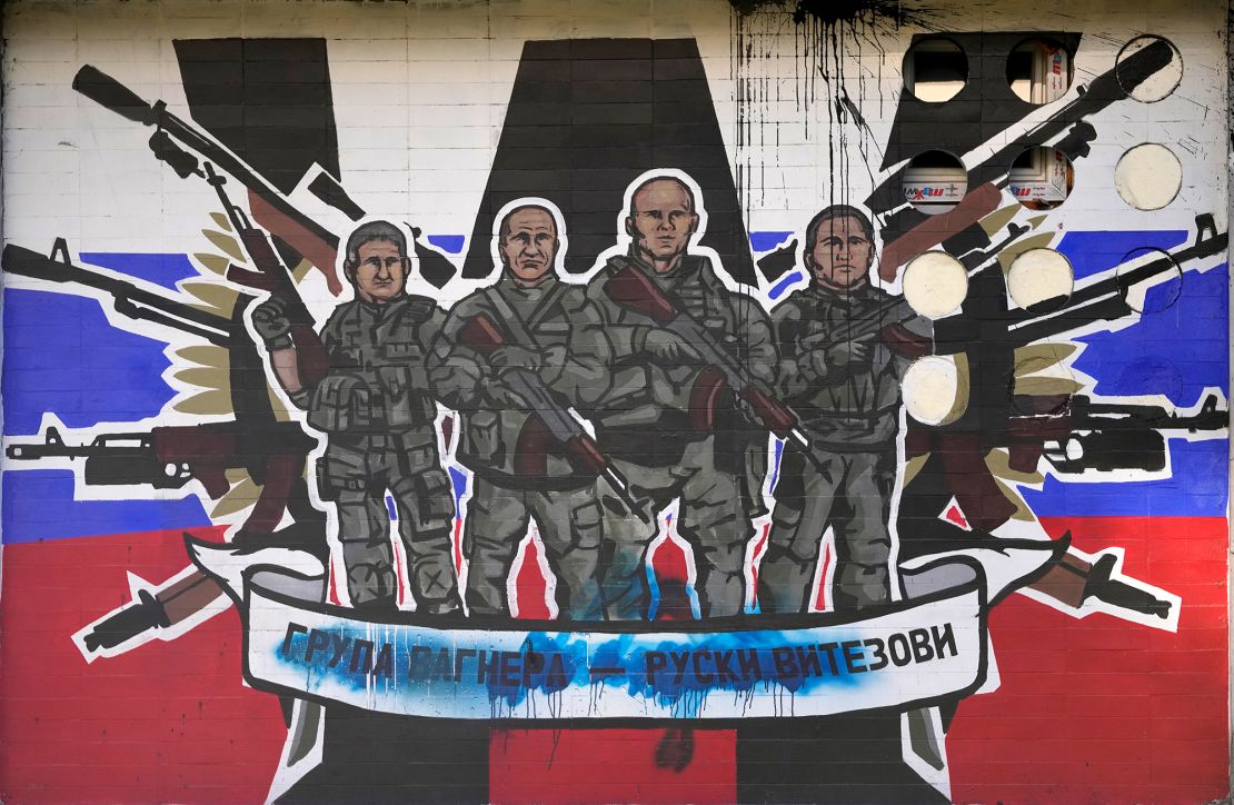 A mural depicting mercenaries of Russia's Wagner Group reads "Wagner Group -- Russian knights" on a wall in Belgrade, Serbia is pictured on January 13, 2023.