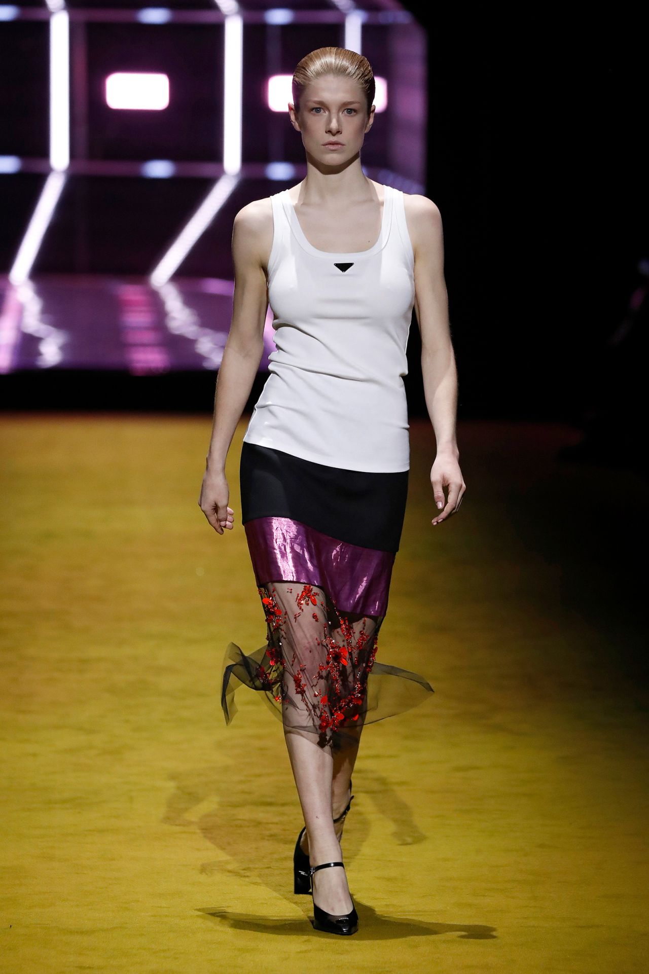 Prada was one of a slew of designers who showed plain white tank tops for Fall-Winter 2022.