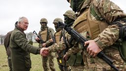 Britain's King Charles III (L) meets with Ukrainian recruits being trained by British and international partner forces at a site in Wiltshire in south-west England on February 20, 2023. - The recruits are completing five weeks of basic combat training by British and international partner forces, before returning to fight in Ukraine. (Photo by Chris Jackson / POOL / AFP) (Photo by CHRIS JACKSON/POOL/AFP via Getty Images)