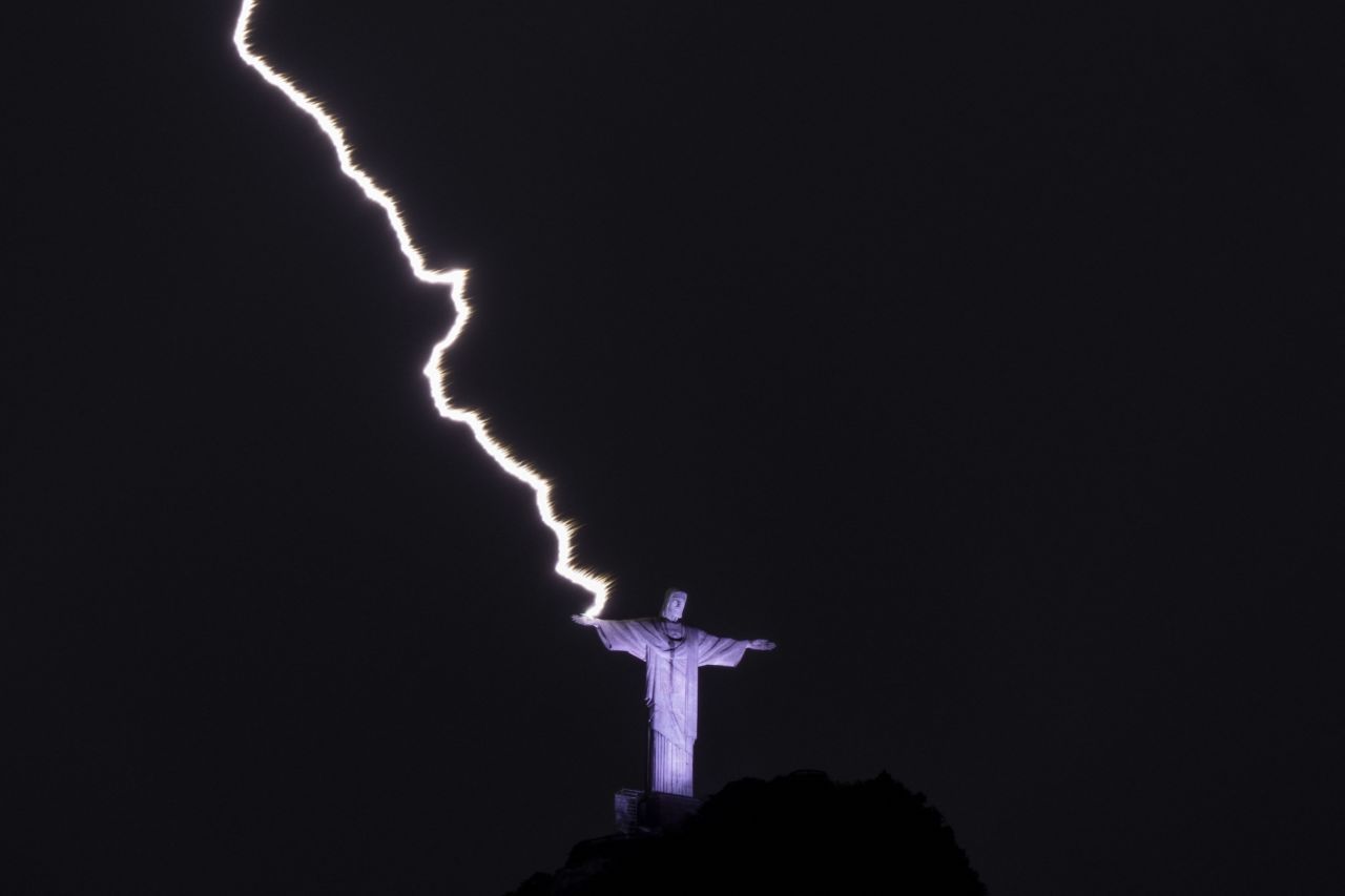 A bolt of lightning hits the hand of the Christ the Redeemer statue in Rio de Janeiro on Tuesday, February 21.