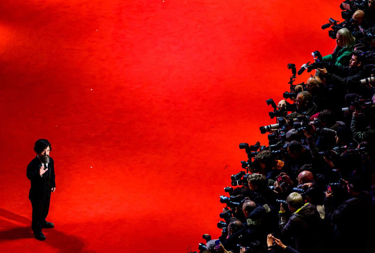 Actor Peter Dinklage poses for photographers at the Berlin International Film Festival as he arrives on the red carpet for the premiere of "She Came to Me" on Thursday, February 16.