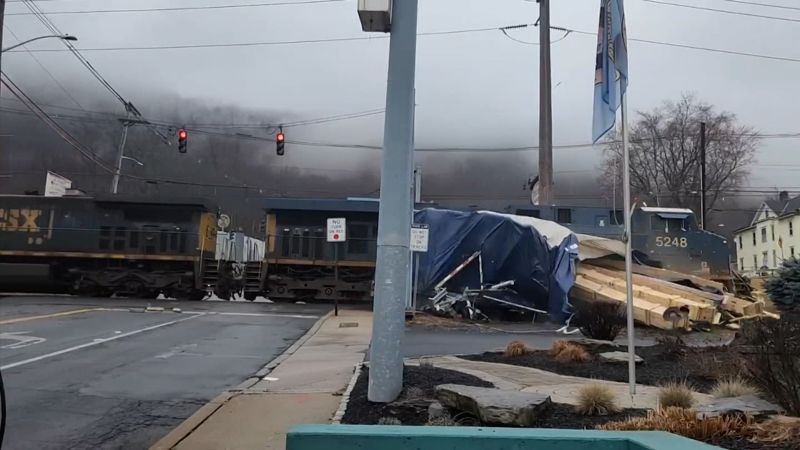 Video shows freight train smash into truck seconds after driver got out | CNN