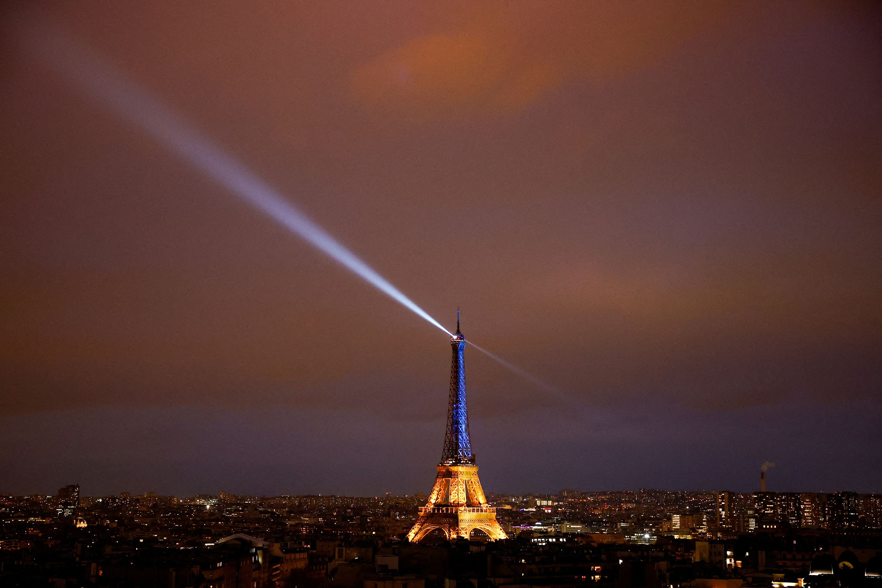 The Eiffel Tower lit up with Ukraine's national colors.