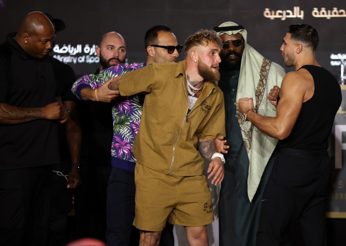 Paul and Fury clash during their press conference. 
