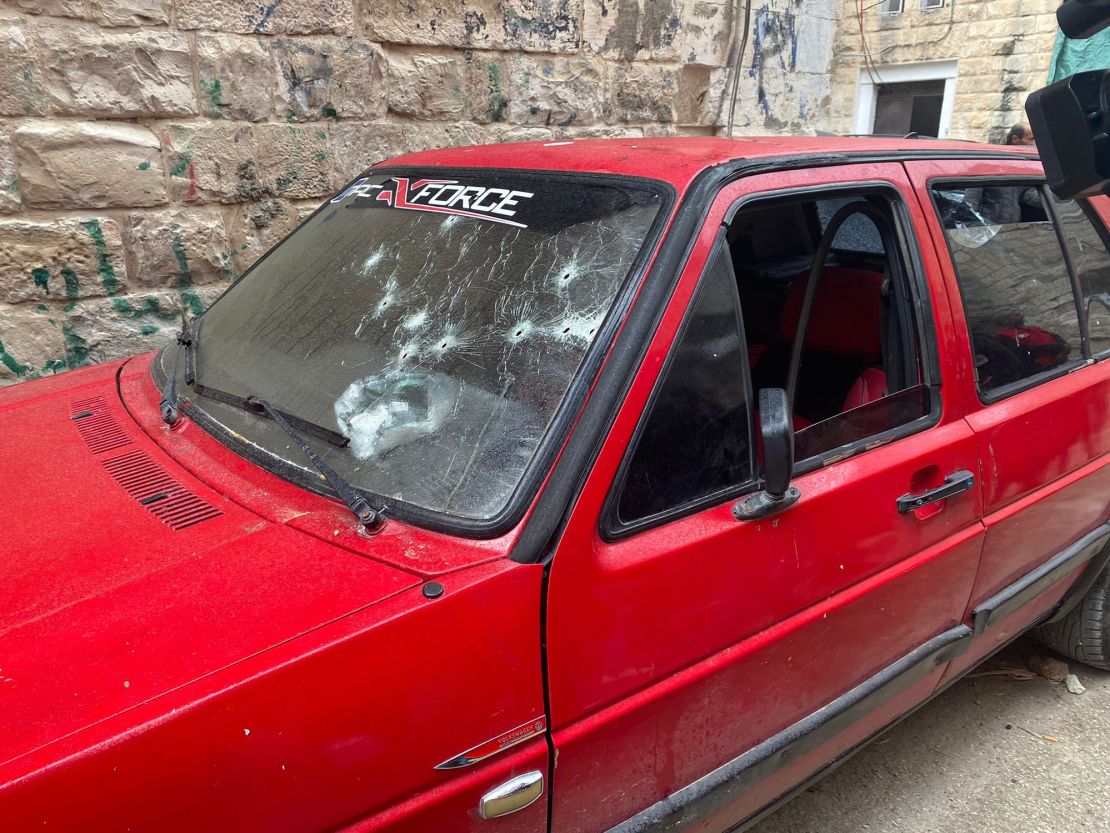 Bullet holes are seen on a car in Nablus, the day after the deadly raid.