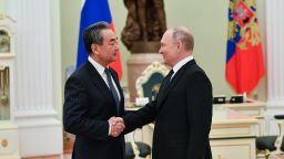 Russian President Vladimir Putin meets with Wang Yi, a member of the Political Bureau of the Communist Party of China CPC Central Committee and director of the Office of the Foreign Affairs Commission of the CPC Central Committee, in Moscow, Russia, Feb. 22, 2022. 