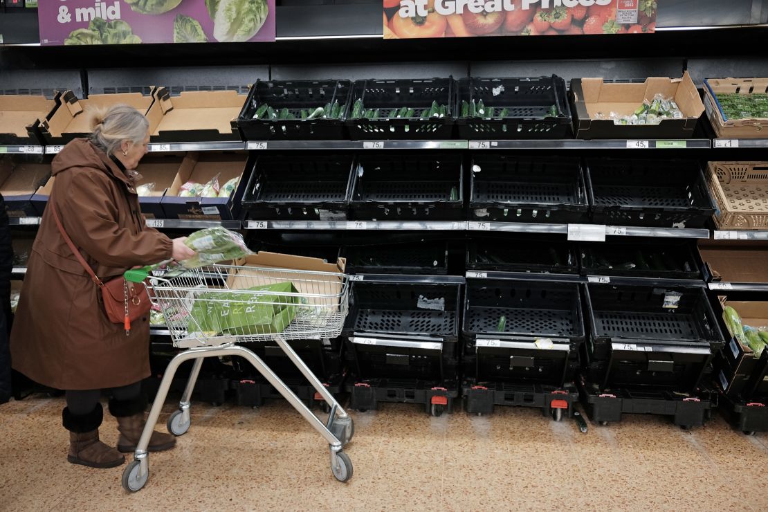 Empty fruit and vegetable shelves at an Asda in east London on February 21, 2023. A shortage of tomatoes affecting UK supermarkets is widening to other fruit and vegetables and is likely to last weeks, retailers have warned. Photo by Yui Mok/PA Images via Getty Images.