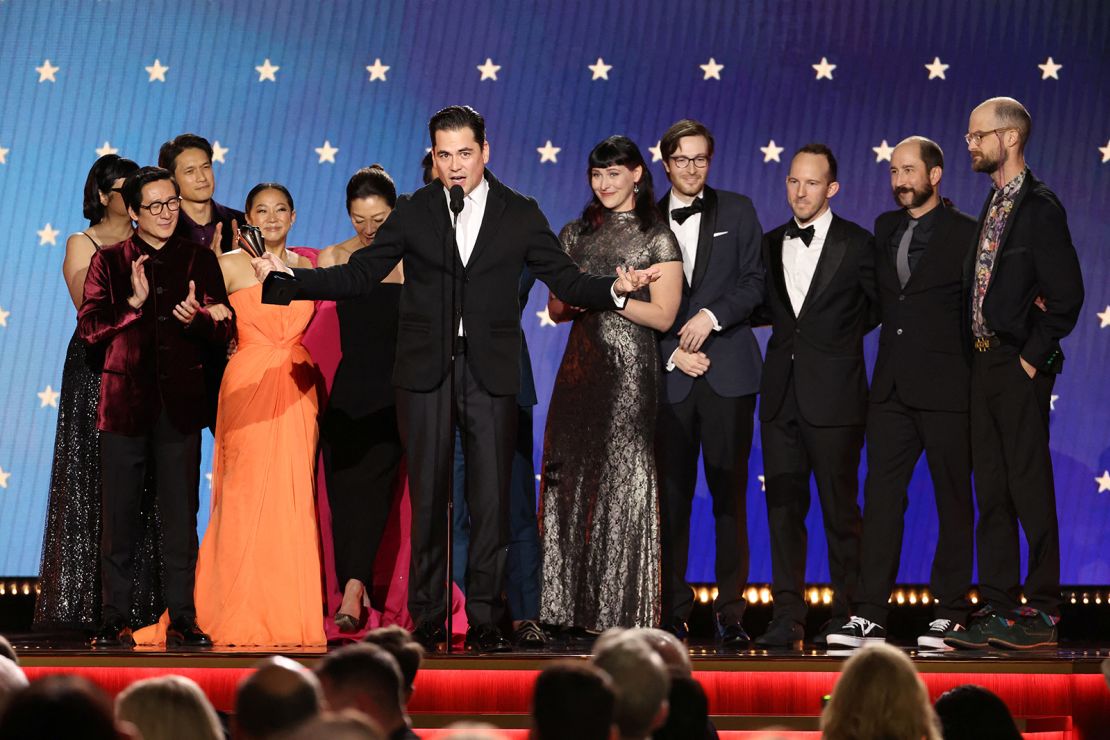 Jonathan Wang speaks as the cast and crew of  "Everything Everywhere All at Once" accept the Best Picture award during the Critics Choice Awards.