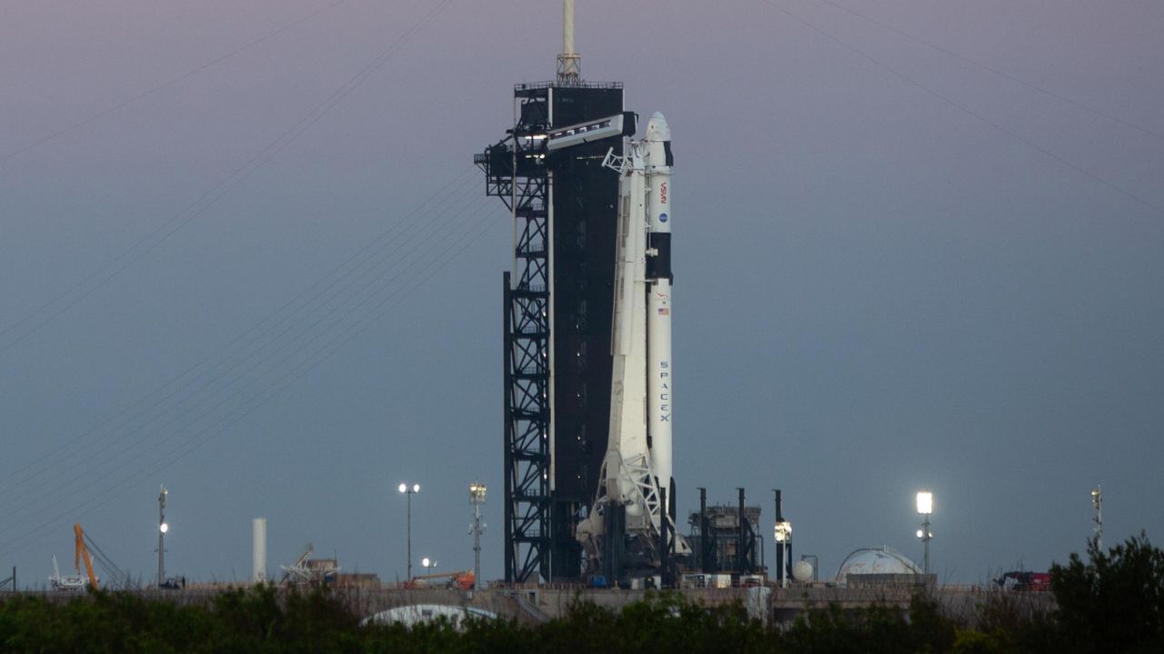 A SpaceX Falcon 9 rocket, with the company's Dragon spacecraft on top, is seen at sunrise on the launch pad on February 23 at NASA's Kennedy Space Center in Florida. 