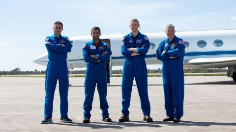 SpaceX Crew-6 astronauts pause for a photograph after arriving at Kennedy Space Center's Launch and Landing Facility in Florida on Feb. 21, 2023. From left are Roscosmos cosmonaut Andrey Fedyaev, UAE (United Arab Emirates) astronaut Sultan Alneyadi, and NASA astronauts Warren 