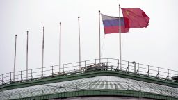 The flags of Russia and China flutter on the roof of a hotel with the flags of other countries removed, in central St. Petersburg, Russia, Wednesday, Nov. 30, 2022. (AP Photo/Dmitri Lovetsky)