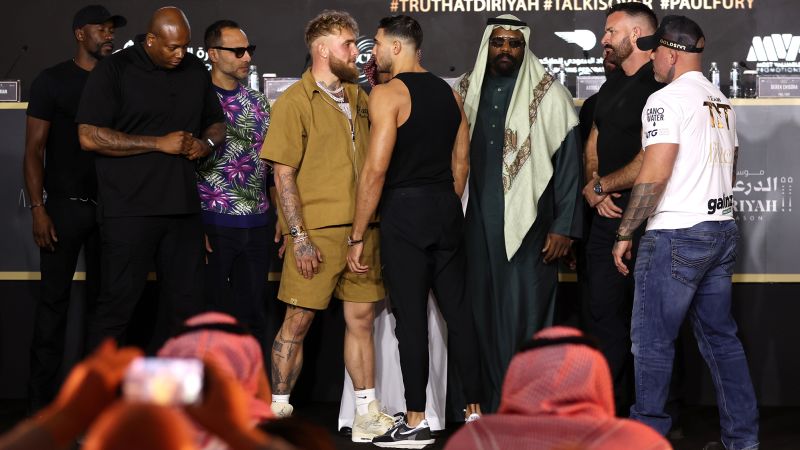 NextImg:Tommy Fury defeats social media influencer Jake Paul by split decision | CNN