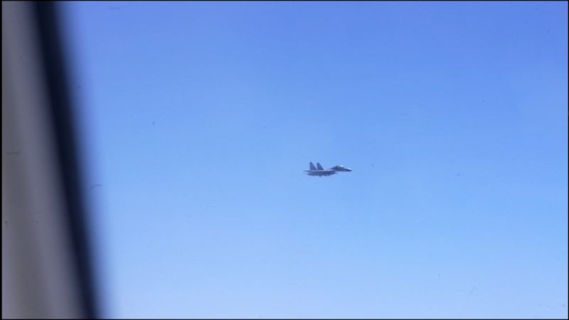 NextImg:See Chinese fighter jet fly by US plane carrying CNN crew | CNN