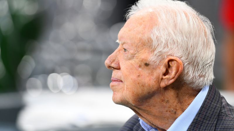 NextImg:Jimmy Carter's children and grandchildren remain at his side during hospice care, relative says | CNN