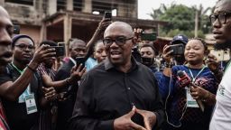 Labour Party presidential candidate Peter Obi (C) talks to the media at outside a polling station in Amatutu on February 25, 2023, before polls open during Nigeria's presidential and general election. (Photo by Patrick Meinhardt / AFP) (Photo by PATRICK MEINHARDT/AFP via Getty Images)