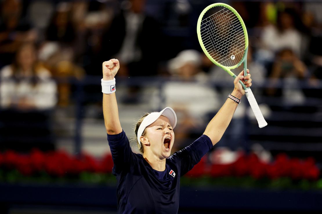 Krejčíková celebrates defeating Świątek in the final of the Dubai Tennis Championships. 
