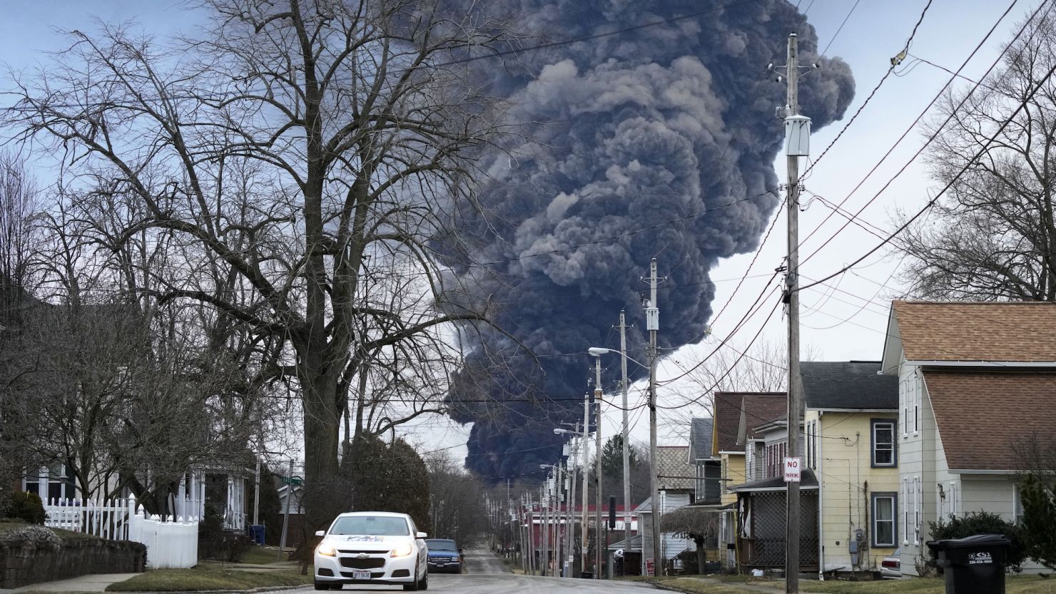 A black plume rises over East Palestine, Ohio, due to the controlled detonation of a portion of the derailed Norfolk Southern train on Feb. 6, 2023.