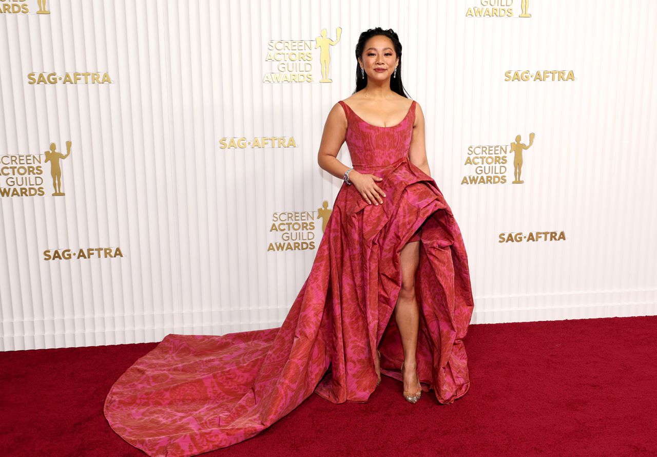 "Everything Everywhere All at Once" star Stephanie Hsu wore a floral Carolina Herrera dress with an extravagant train.