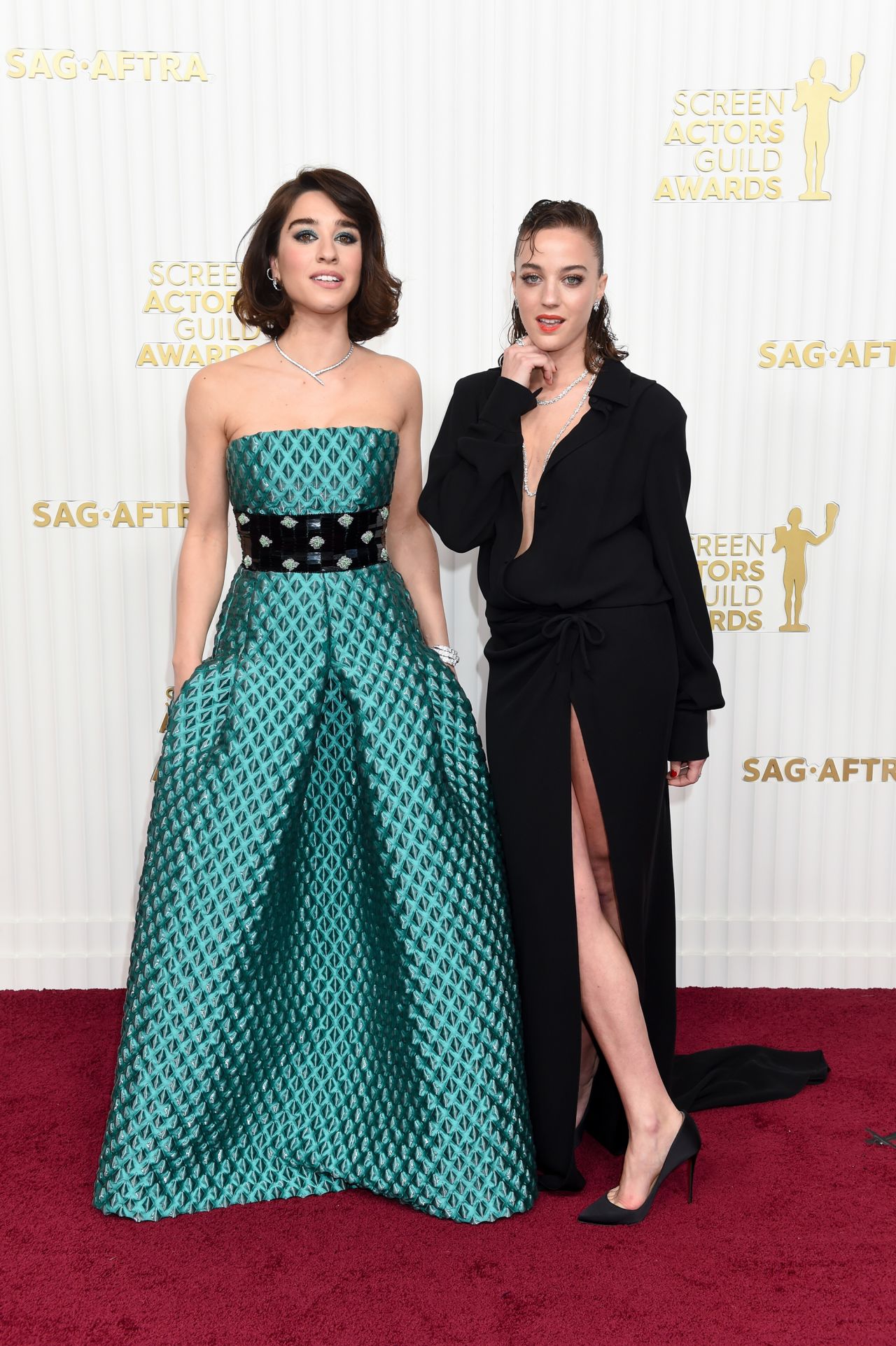 Simona Tabasco and Beatrice Grannò in Armani Privé and Valentino, respectively.