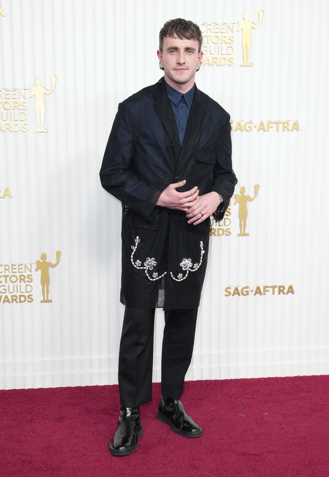 Paul Mescal's sheer overcoat was embroidered with bejeweled detailing.