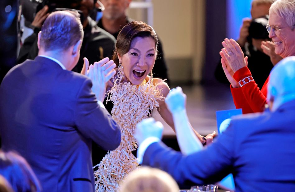 Michelle Yeoh reacts to winning the leading female actor in a film award for "Everything Everywhere All at Once."