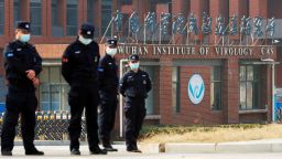 Security personnel keep watch outside Wuhan Institute of Virology during the visit by the World Health Organization (WHO) team tasked with investigating the origins of the coronavirus disease (COVID-19), in Wuhan, Hubei province, China February 3, 2021.