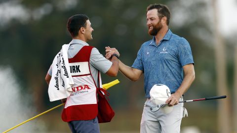 Kirk was congratulated by his caddy after the win.