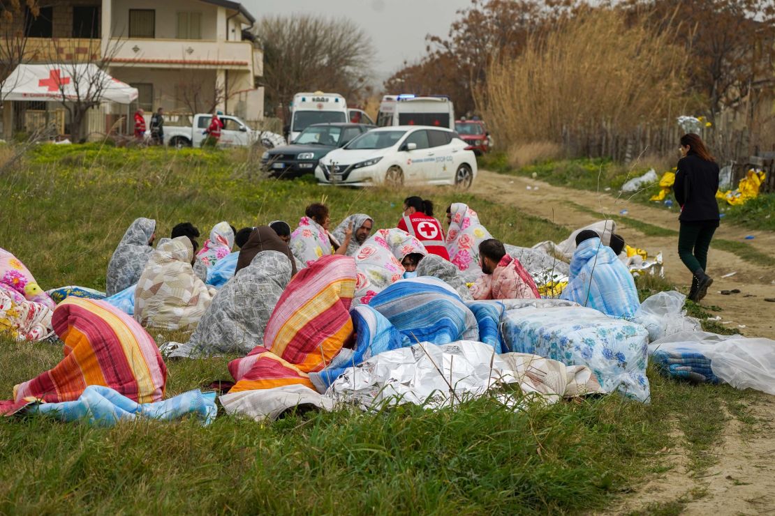 Some of the migrants who were saved from a deadly shipwreck over the weekend were rescued and warmed by blankets on February 26, 2023.